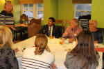 Rishi listens to the presentation of the Brompton Flood Protection Group