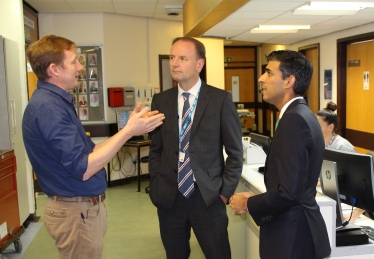 Rishi Sunak with Simon Stevens and Dr James Dunbar